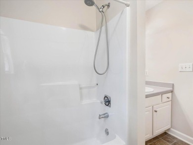 Beautifully updated 3-bedroom, 2.5-bath home in the highly on Hedingham Golf and Athletic Club in North Carolina - for sale on GolfHomes.com, golf home, golf lot