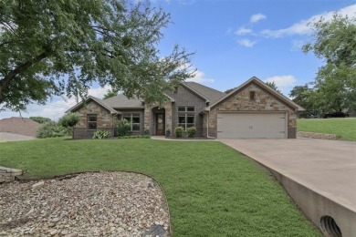 Welcome Home! A  beautifully appointed 4BD, 3BA home nestled in on De Cordova Bend Country Club in Texas - for sale on GolfHomes.com, golf home, golf lot