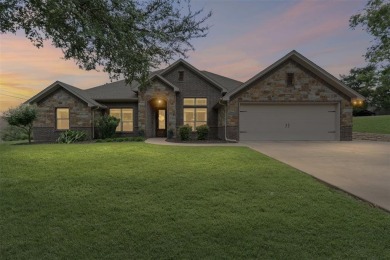 Welcome Home! A  beautifully appointed 4BD, 3BA home nestled in on De Cordova Bend Country Club in Texas - for sale on GolfHomes.com, golf home, golf lot