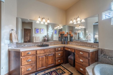 Experience luxurious living in this exquisite AJ Construction on Entrada at Snow Canyon in Utah - for sale on GolfHomes.com, golf home, golf lot