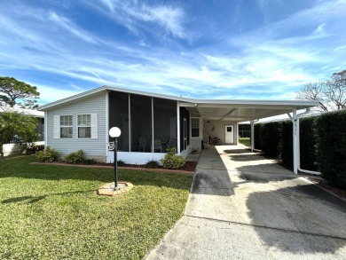 This bright home has been lovingly remodeled bringing modern on Crystal Lake Club in Florida - for sale on GolfHomes.com, golf home, golf lot