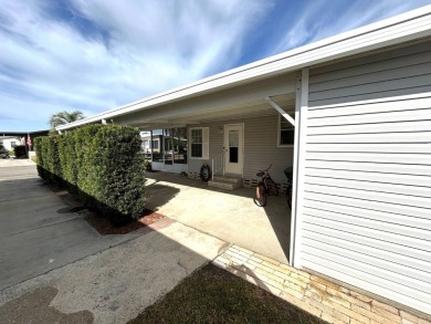 This bright home has been lovingly remodeled bringing modern on Crystal Lake Club in Florida - for sale on GolfHomes.com, golf home, golf lot
