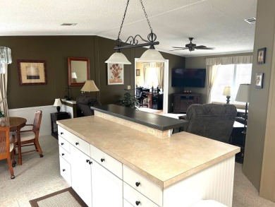 This bright home has been lovingly remodeled bringing modern on Crystal Lake Club in Florida - for sale on GolfHomes.com, golf home, golf lot