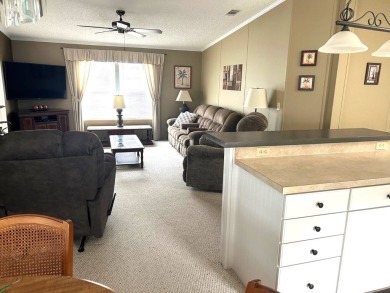 This bright home has been lovingly remodeled bringing modern on Crystal Lake Club in Florida - for sale on GolfHomes.com, golf home, golf lot