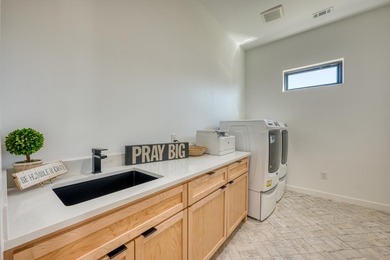 NEW TO MARKET: 2024 Modern Waterfront Masterpiece in Clearwater on Legends Golf Course in Texas - for sale on GolfHomes.com, golf home, golf lot