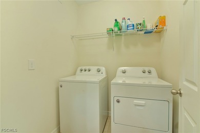 NEWER 3BR/2BA HOME WITH TERRIFIC CENTER OF LAKE VIEW & WATER on Herons Glen Golf and Country Club in Florida - for sale on GolfHomes.com, golf home, golf lot