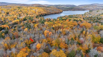 This lovely 4-bedroom, 4-bath home in Eastman features an open on Eastman Golf Links in New Hampshire - for sale on GolfHomes.com, golf home, golf lot