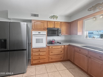 Great home for full-time or seasonal living! Offering a on Sun City Lakes West and East in Arizona - for sale on GolfHomes.com, golf home, golf lot