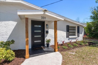MOTIVATED SELLER!  Impressive Mid-Century Modern Belleair home on Belleair Country Club in Florida - for sale on GolfHomes.com, golf home, golf lot