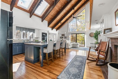 This lovely 4-bedroom, 4-bath home in Eastman features an open on Eastman Golf Links in New Hampshire - for sale on GolfHomes.com, golf home, golf lot