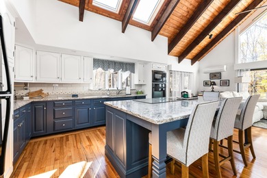 This lovely 4-bedroom, 4-bath home in Eastman features an open on Eastman Golf Links in New Hampshire - for sale on GolfHomes.com, golf home, golf lot