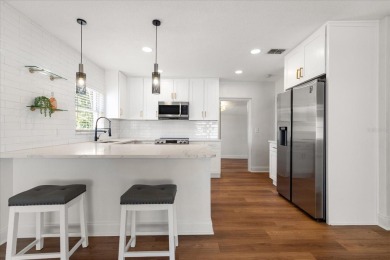 MOTIVATED SELLER!  Impressive Mid-Century Modern Belleair home on Belleair Country Club in Florida - for sale on GolfHomes.com, golf home, golf lot