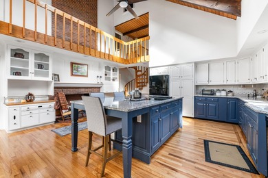 This lovely 4-bedroom, 4-bath home in Eastman features an open on Eastman Golf Links in New Hampshire - for sale on GolfHomes.com, golf home, golf lot