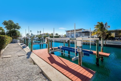 Savor the Coastal Lifestyle in this Elevated, Whitehead on Key Royale Club in Florida - for sale on GolfHomes.com, golf home, golf lot