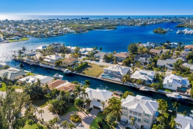 Savor the Coastal Lifestyle in this Elevated, Whitehead on Key Royale Club in Florida - for sale on GolfHomes.com, golf home, golf lot