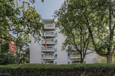 Welcome to West Akron's exceedingly sought-after Carlton House on Portage Country Club in Ohio - for sale on GolfHomes.com, golf home, golf lot