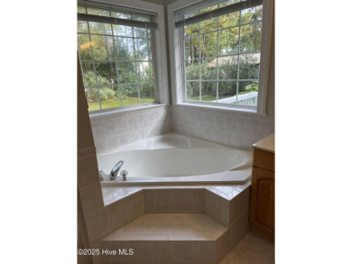 Welcome to your retreat in Boiling Spring Lakes! This home is on The Lakes Country Club in North Carolina - for sale on GolfHomes.com, golf home, golf lot