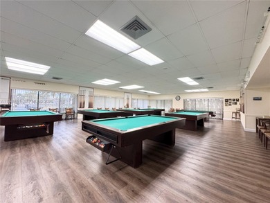 Immaculate and beautifully updated unit in a desirable 55+ on Sunrise Lakes Phase III in Florida - for sale on GolfHomes.com, golf home, golf lot