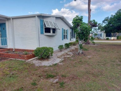This artistic 2-bedroom 2-bathroom spacious home is located in a on Pine Lakes Country Club in Florida - for sale on GolfHomes.com, golf home, golf lot
