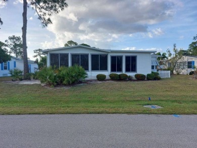 This artistic 2-bedroom 2-bathroom spacious home is located in a on Pine Lakes Country Club in Florida - for sale on GolfHomes.com, golf home, golf lot