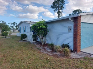 This artistic 2-bedroom 2-bathroom spacious home is located in a on Pine Lakes Country Club in Florida - for sale on GolfHomes.com, golf home, golf lot