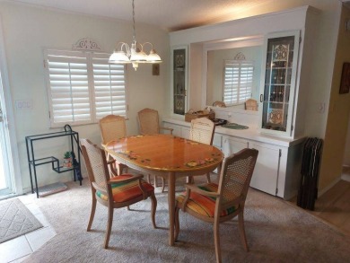 This artistic 2-bedroom 2-bathroom spacious home is located in a on Pine Lakes Country Club in Florida - for sale on GolfHomes.com, golf home, golf lot