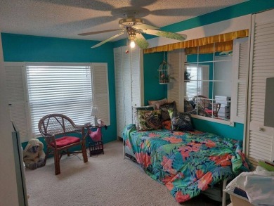 This artistic 2-bedroom 2-bathroom spacious home is located in a on Pine Lakes Country Club in Florida - for sale on GolfHomes.com, golf home, golf lot