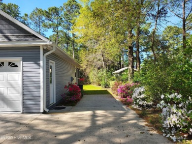 Welcome to your retreat in Boiling Spring Lakes! This home is on The Lakes Country Club in North Carolina - for sale on GolfHomes.com, golf home, golf lot