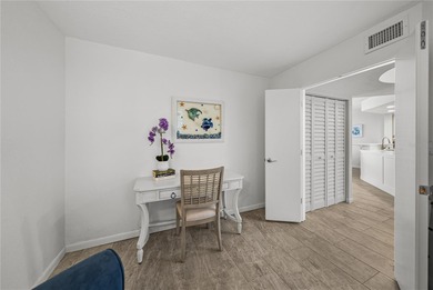 Experience vibrant coastal living at its finest in this on Isla Del Sol Yacht and Country Club in Florida - for sale on GolfHomes.com, golf home, golf lot