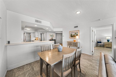 Experience vibrant coastal living at its finest in this on Isla Del Sol Yacht and Country Club in Florida - for sale on GolfHomes.com, golf home, golf lot