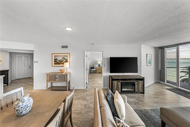 Experience vibrant coastal living at its finest in this on Isla Del Sol Yacht and Country Club in Florida - for sale on GolfHomes.com, golf home, golf lot