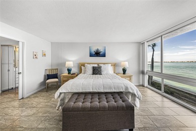 Experience vibrant coastal living at its finest in this on Isla Del Sol Yacht and Country Club in Florida - for sale on GolfHomes.com, golf home, golf lot