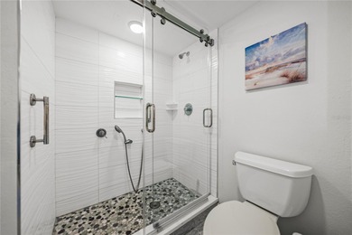 Experience vibrant coastal living at its finest in this on Isla Del Sol Yacht and Country Club in Florida - for sale on GolfHomes.com, golf home, golf lot