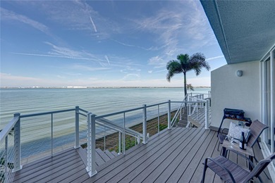 Experience vibrant coastal living at its finest in this on Isla Del Sol Yacht and Country Club in Florida - for sale on GolfHomes.com, golf home, golf lot