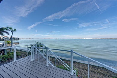 Experience vibrant coastal living at its finest in this on Isla Del Sol Yacht and Country Club in Florida - for sale on GolfHomes.com, golf home, golf lot