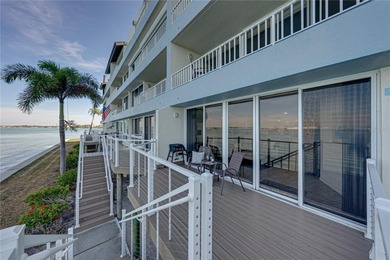 Experience vibrant coastal living at its finest in this on Isla Del Sol Yacht and Country Club in Florida - for sale on GolfHomes.com, golf home, golf lot