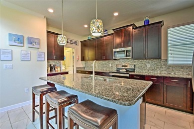 Welcome to 1636 Moon Valley Dr. Discover unparalleled elegance on The Oasis Club at Champions Gate in Florida - for sale on GolfHomes.com, golf home, golf lot