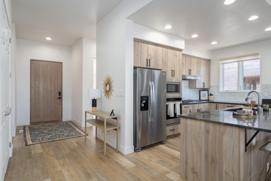 Inside Entrada's Paiute Springs, this fully renovated home on Entrada at Snow Canyon in Utah - for sale on GolfHomes.com, golf home, golf lot