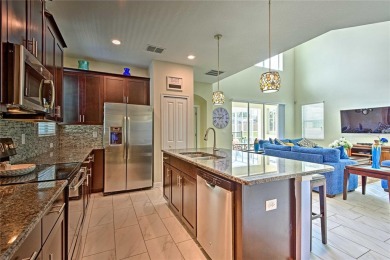 Welcome to 1636 Moon Valley Dr. Discover unparalleled elegance on The Oasis Club at Champions Gate in Florida - for sale on GolfHomes.com, golf home, golf lot