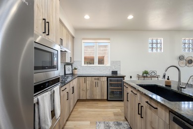 Inside Entrada's Paiute Springs, this fully renovated home on Entrada at Snow Canyon in Utah - for sale on GolfHomes.com, golf home, golf lot