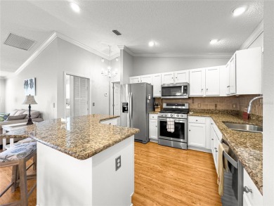 Stunning TURNKEY AMARILLO Model with A TWO CAR PLUS GOLF CART on Nancy Lopez Legacy Golf and Country Club in Florida - for sale on GolfHomes.com, golf home, golf lot