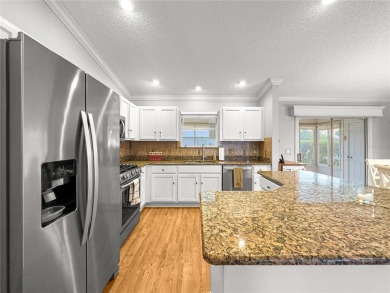 Stunning TURNKEY AMARILLO Model with A TWO CAR PLUS GOLF CART on Nancy Lopez Legacy Golf and Country Club in Florida - for sale on GolfHomes.com, golf home, golf lot