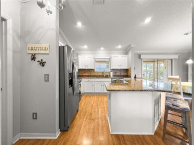Stunning TURNKEY AMARILLO Model with A TWO CAR PLUS GOLF CART on Nancy Lopez Legacy Golf and Country Club in Florida - for sale on GolfHomes.com, golf home, golf lot