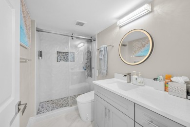Stunning 6th-floor 3BR/2BA condo in the coveted Regency at Boca on Boca Pointe Country Club in Florida - for sale on GolfHomes.com, golf home, golf lot