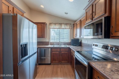 Welcome to this charming  beautifully maintained 2-bedroom on Pueblo Golf Course in Arizona - for sale on GolfHomes.com, golf home, golf lot