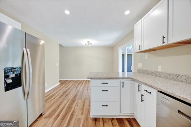 This 4-bedroom, 2-bath home has been completely updated from top on Golf Club of Macon in Georgia - for sale on GolfHomes.com, golf home, golf lot