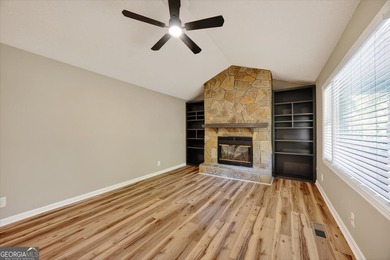 This 4-bedroom, 2-bath home has been completely updated from top on Golf Club of Macon in Georgia - for sale on GolfHomes.com, golf home, golf lot