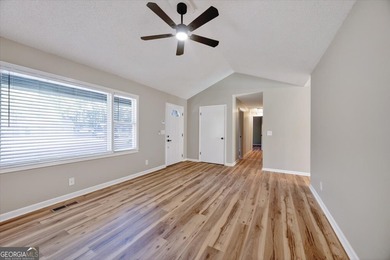 This 4-bedroom, 2-bath home has been completely updated from top on Golf Club of Macon in Georgia - for sale on GolfHomes.com, golf home, golf lot