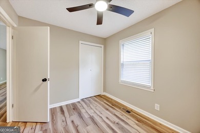 This 4-bedroom, 2-bath home has been completely updated from top on Golf Club of Macon in Georgia - for sale on GolfHomes.com, golf home, golf lot