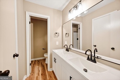 This 4-bedroom, 2-bath home has been completely updated from top on Golf Club of Macon in Georgia - for sale on GolfHomes.com, golf home, golf lot